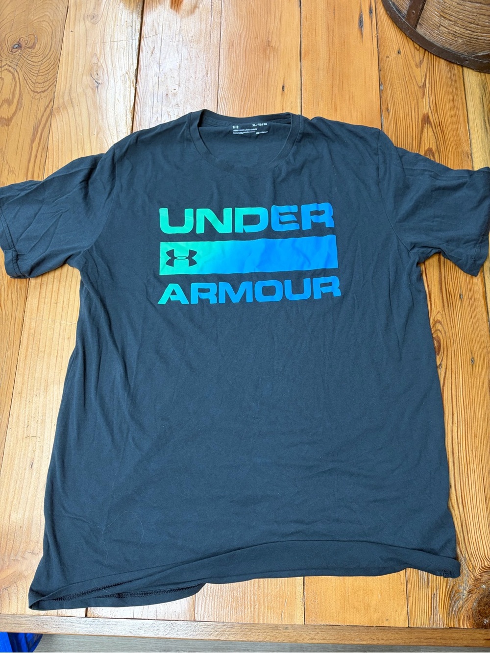 Under Armour Black Tee with Teal-to-Blue Gradient Logo